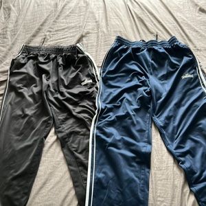 Black and Blue Men’s Spalding track pants.
